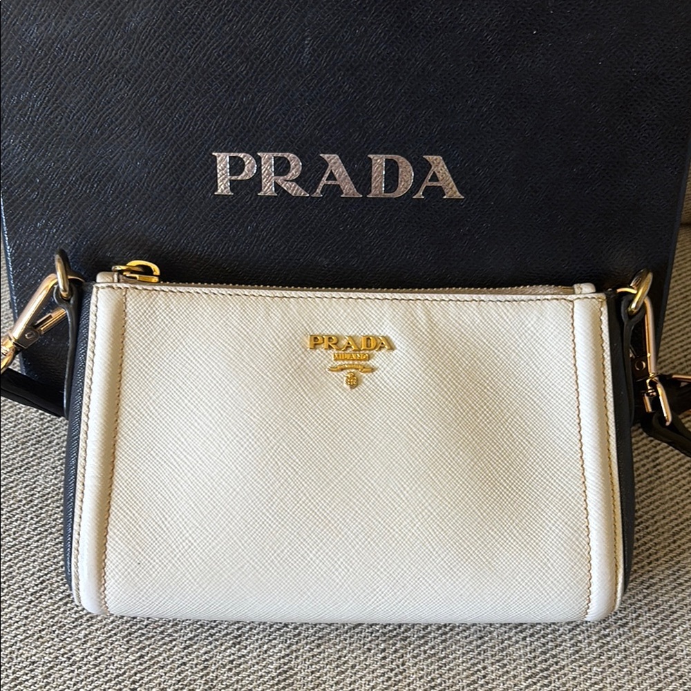 PRADA Cream Leather Clutch/crossbody
Saffiano Leather Esplanade